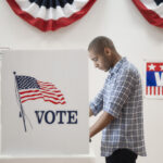 Man voting in polling place