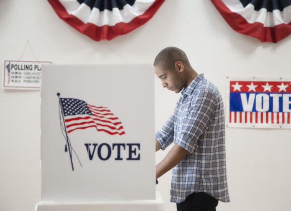 Man voting in polling place